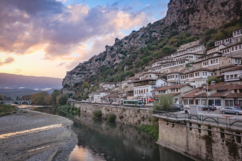 Berat, Albania - a river with buildings on the side