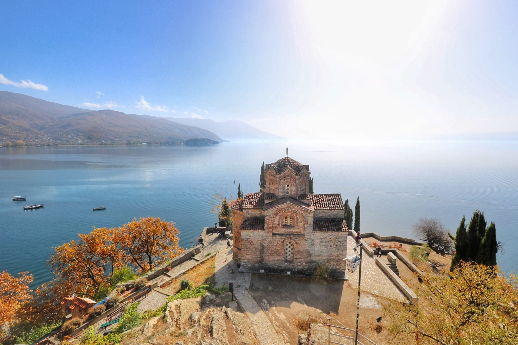 Lake Ohrid - a building on a hill overlooking a body of water